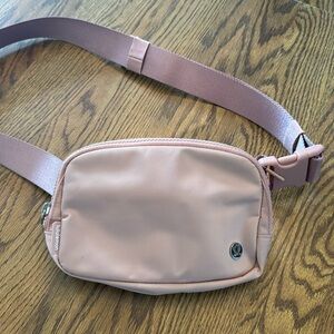 Lululemon belt bag, mauve/light pink color